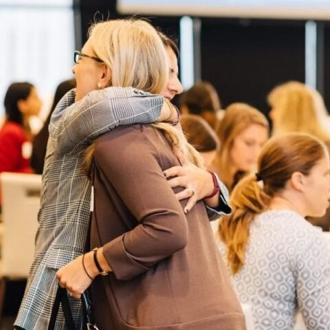 members-hugging
